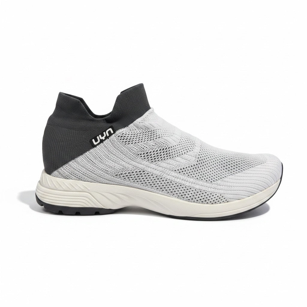 Sneakers bianca e nera con rinforzo posteriore elasticizzato UYN