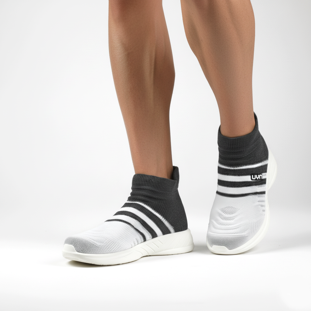 Sneaker calza UYN bianco/nero a righe